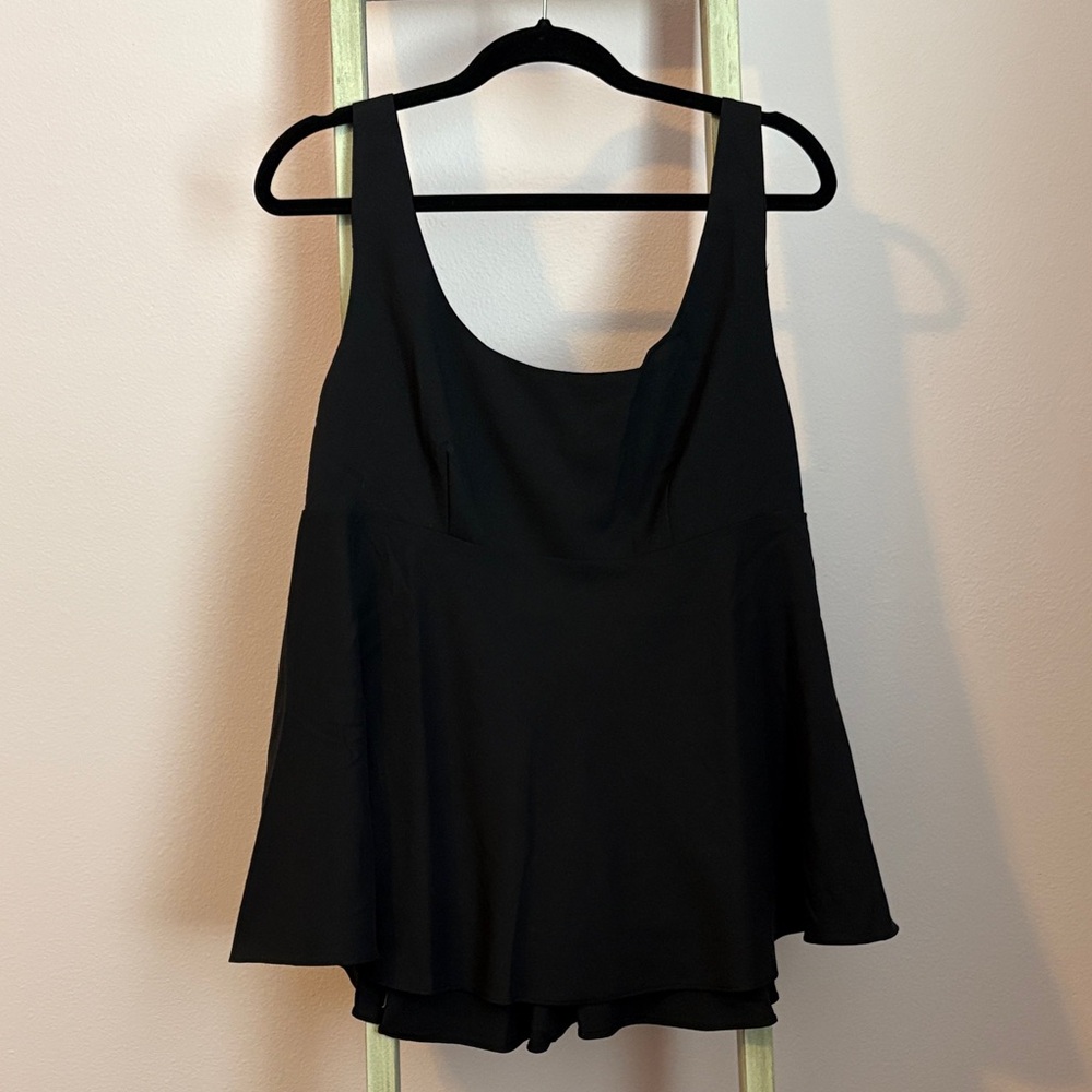 Pomander Place Black Sleeveless Peplum Top